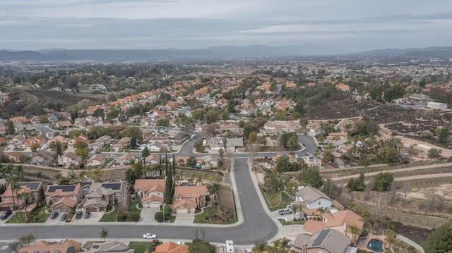 birds eye view of property featuring a mountain view and a residential view