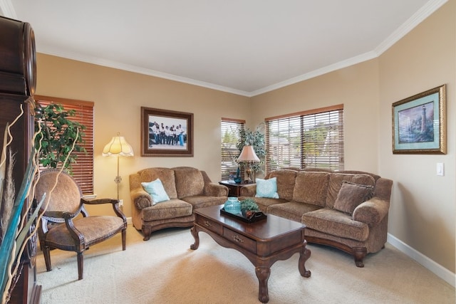 living room with baseboards, light colored carpet, and crown molding