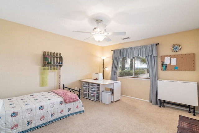 bedroom with visible vents, baseboards, ceiling fan, and carpet flooring