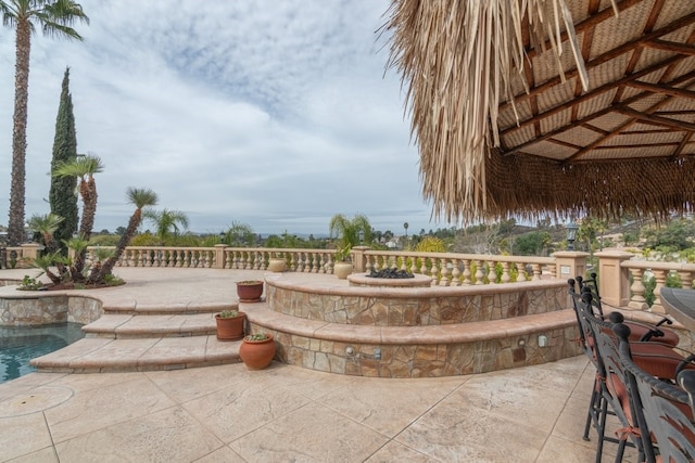 view of patio / terrace featuring an outdoor pool