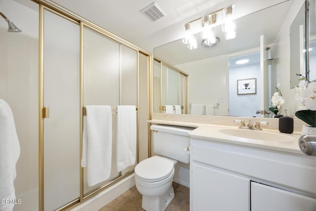 full bath featuring visible vents, vanity, toilet, and a shower stall