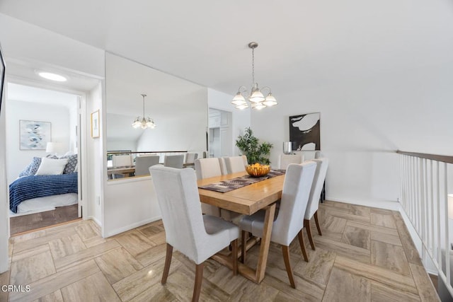 dining area with a notable chandelier