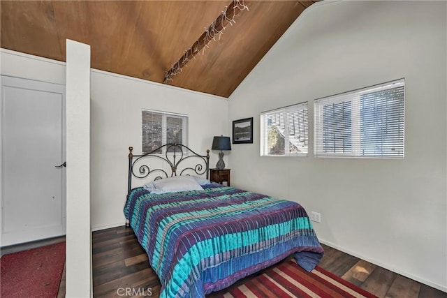 bedroom featuring vaulted ceiling and wood finished floors