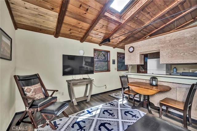 dining area featuring wooden ceiling, lofted ceiling with beams, wood finished floors, and baseboards