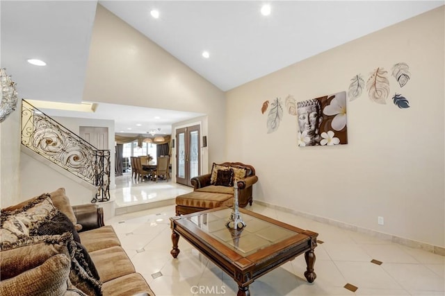 living area featuring lofted ceiling, stairway, recessed lighting, and baseboards