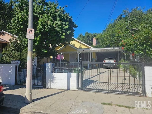 view of front of house featuring a gate and fence