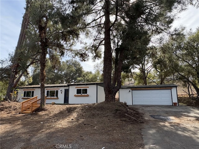 single story home featuring a garage