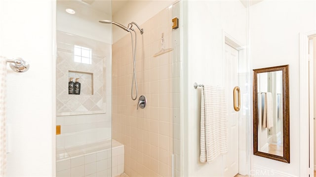 full bathroom featuring a stall shower