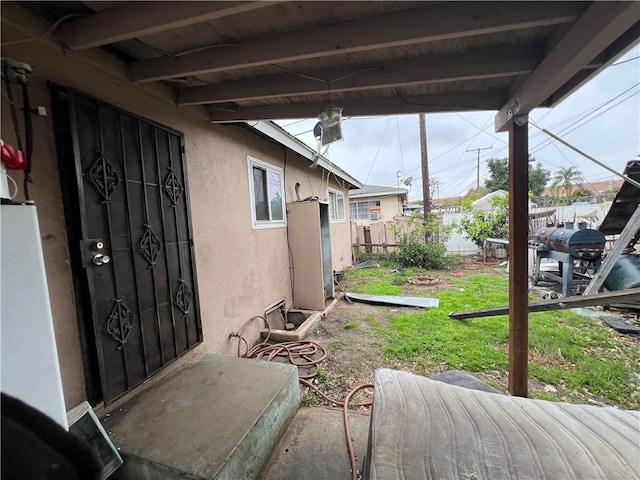 view of patio / terrace with fence