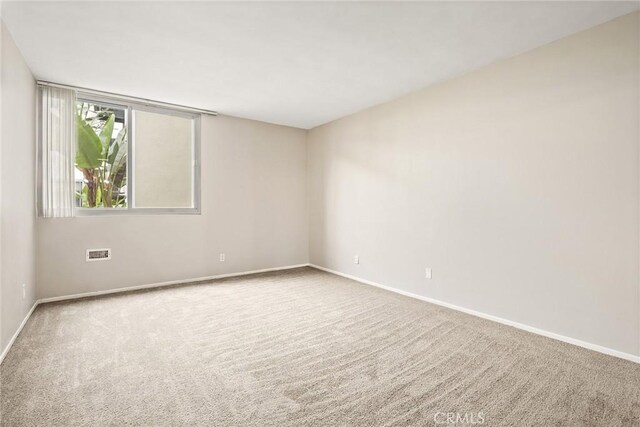 8701 Delgany Ave Unit 105, Playa Del Rey, CA 90293 - unfurnished room with carpet flooring and baseboards
