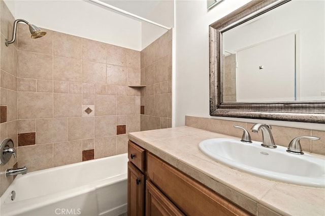 bathroom with vanity and washtub / shower combination