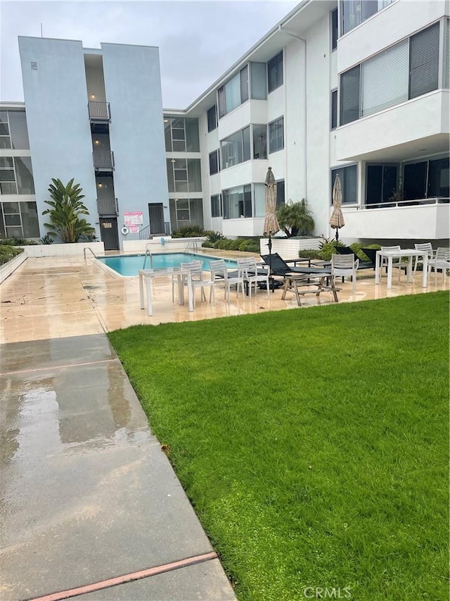 8701 Delgany Ave Unit 105, Playa Del Rey, CA 90293 - community pool featuring a lawn