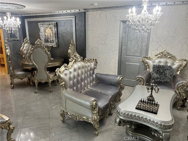 sitting room with a chandelier, marble finish floor, and wallpapered walls