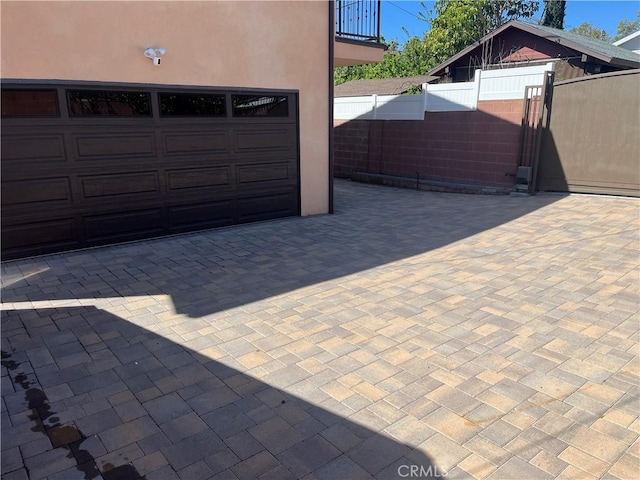 garage featuring fence