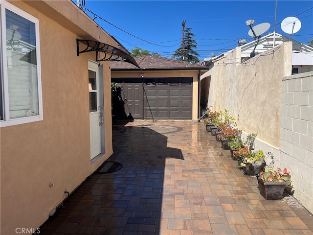 garage featuring fence