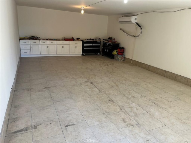 garage featuring an AC wall unit