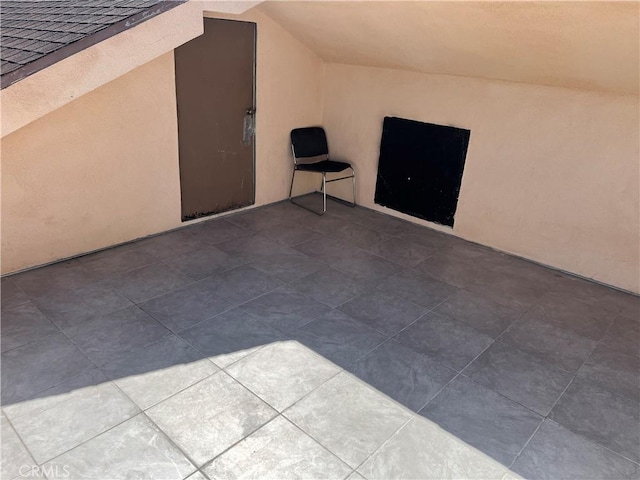 bonus room with lofted ceiling