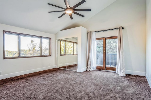 unfurnished bedroom with high vaulted ceiling, access to outside, carpet flooring, baseboards, and ceiling fan