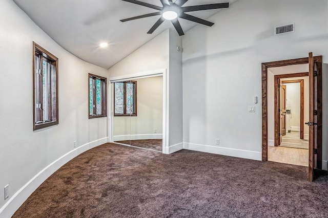 unfurnished room with visible vents, carpet flooring, a ceiling fan, and baseboards