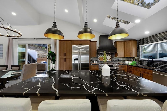 1326 Farmer Rd, Julian, CA 92036 - kitchen featuring a sink, brown cabinetry, premium range hood, and premium appliances
