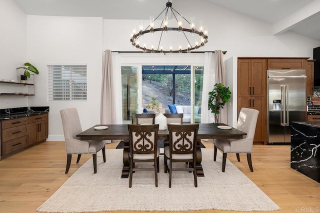 1326 Farmer Rd, Julian, CA 92036 - dining space with light wood-type flooring, an inviting chandelier, baseboards, and vaulted ceiling with beams