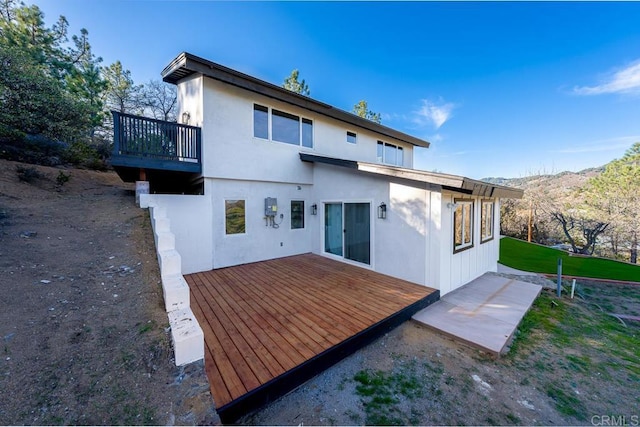 1326 Farmer Rd, Julian, CA 92036 - back of property with a wooden deck and stucco siding