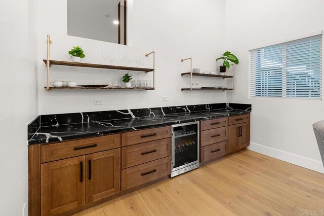1326 Farmer Rd, Julian, CA 92036 - kitchen featuring open shelves, light wood-style flooring, brown cabinets, and wine cooler