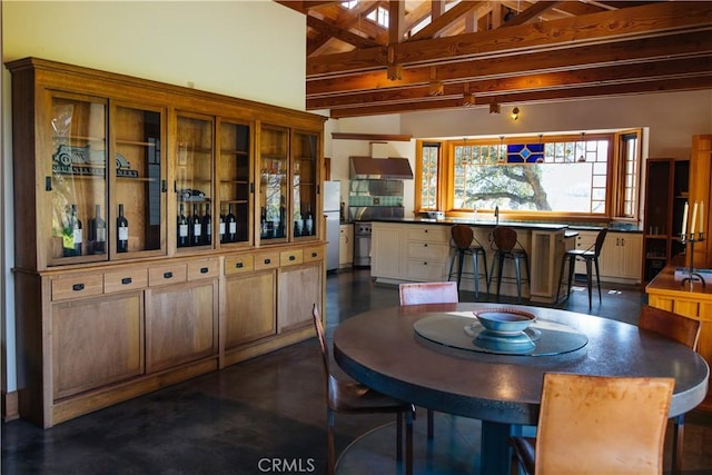 dining room featuring finished concrete floors