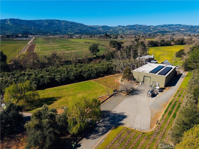 bird's eye view with a mountain view and a rural view