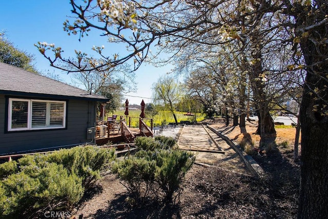 view of yard featuring a deck