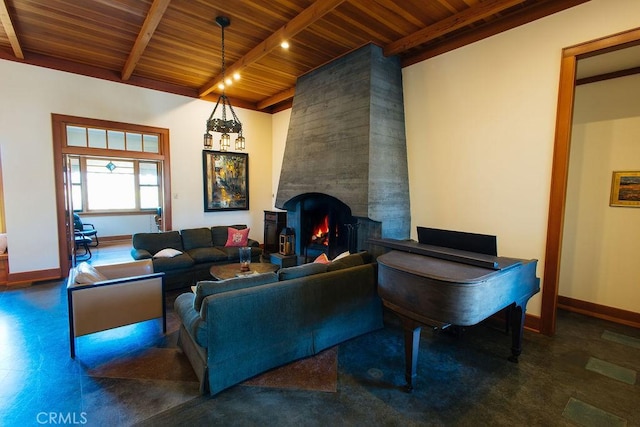 living area with beam ceiling, wood ceiling, baseboards, and a large fireplace