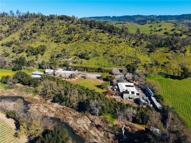 aerial view with a wooded view