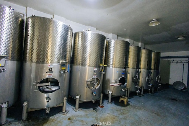 utility room with water heater