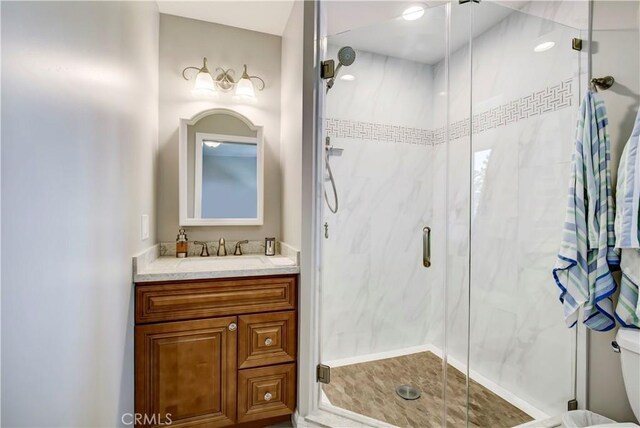 1471 Rosehill, Redlands, CA 92373 - bathroom featuring toilet, a shower stall, and vanity