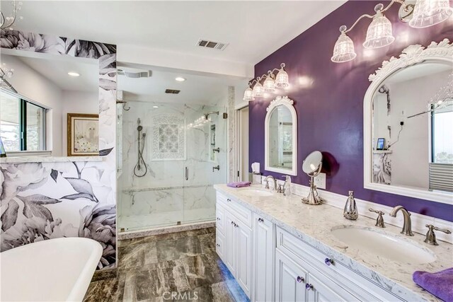 1471 Rosehill, Redlands, CA 92373 - bathroom featuring plenty of natural light, a marble finish shower, a freestanding bath, double vanity, and recessed lighting