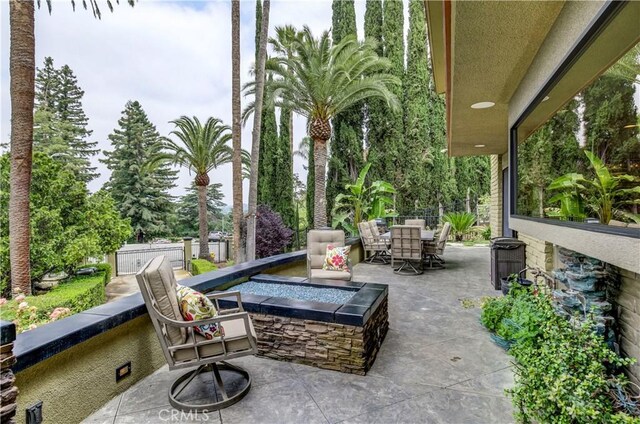 1471 Rosehill, Redlands, CA 92373 - view of patio with an outdoor fire pit and outdoor dining area