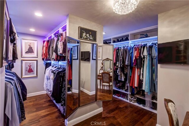 1471 Rosehill, Redlands, CA 92373 - spacious closet with wood finished floors and a chandelier