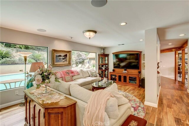 1471 Rosehill, Redlands, CA 92373 - living room featuring light wood-style floors, recessed lighting, and baseboards