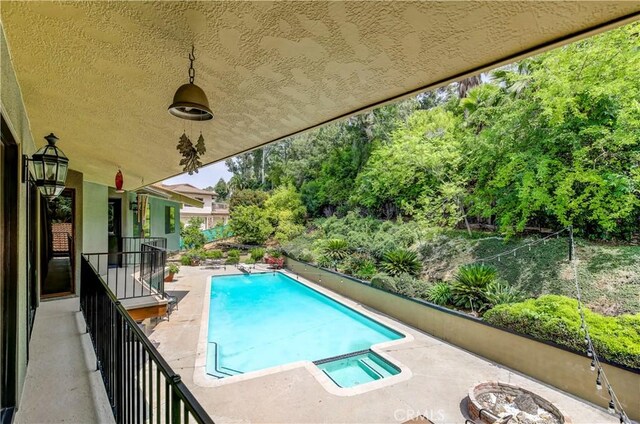 1471 Rosehill, Redlands, CA 92373 - view of swimming pool featuring a patio and an outdoor fire pit