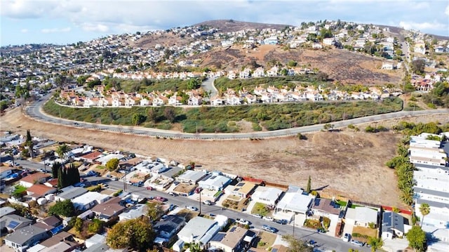 bird's eye view featuring a mountain view and a residential view