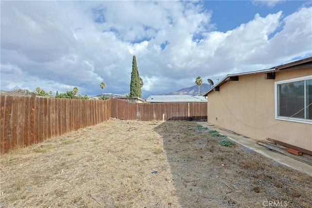 view of yard featuring a fenced backyard