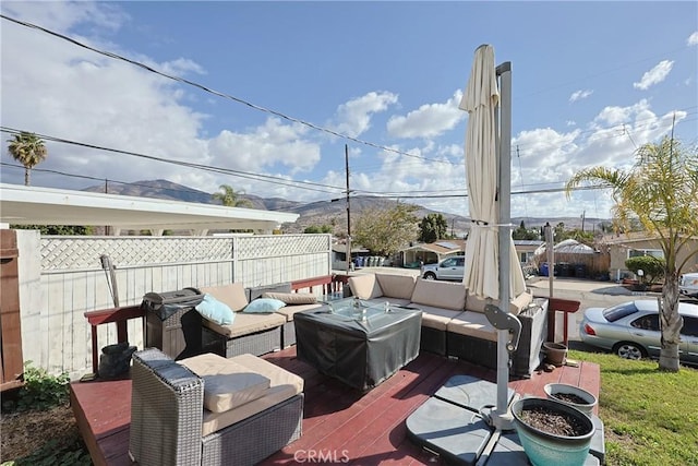 view of patio / terrace with fence and an outdoor hangout area