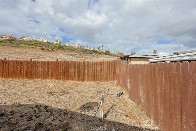 view of yard with fence