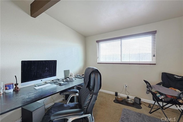 office area featuring lofted ceiling with beams, baseboards, and carpet