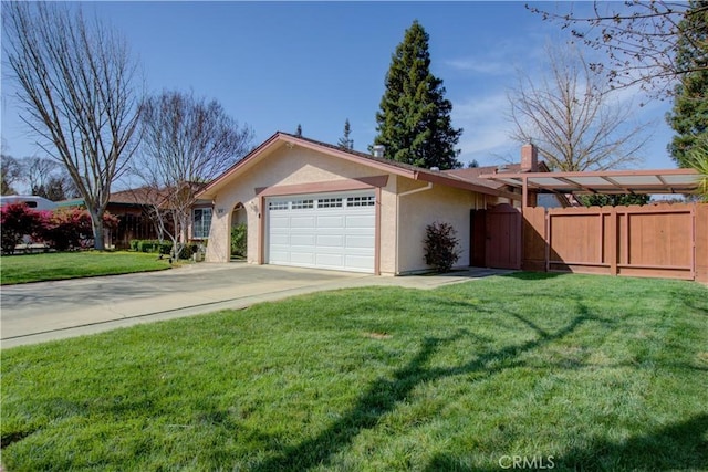 ranch-style house with a front yard, fence, driveway, an attached garage, and stucco siding