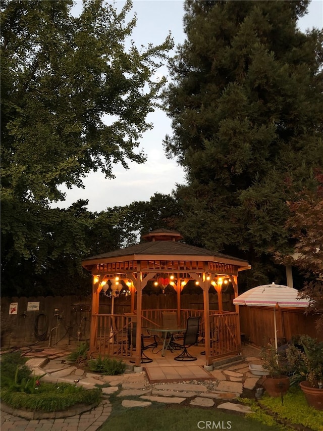 view of patio / terrace with a gazebo and fence