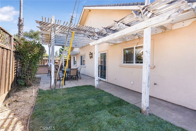 view of yard featuring a patio area, a fenced backyard, and a pergola