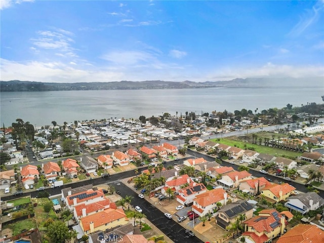 aerial view with a residential view and a water view