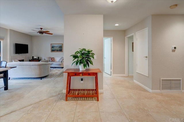 tiled living room featuring visible vents, recessed lighting, baseboards, and a ceiling fan