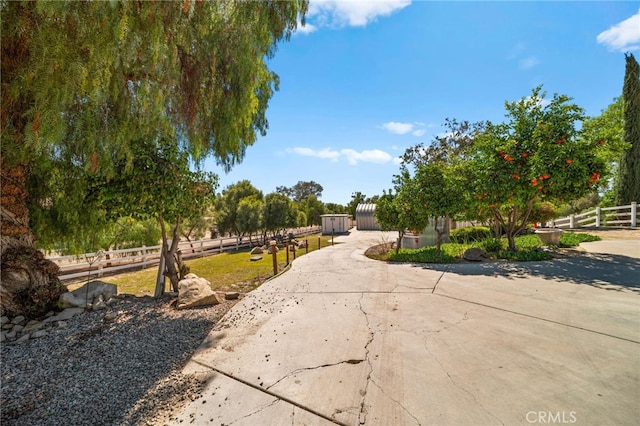 exterior space with concrete driveway